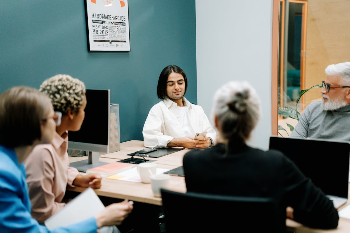 Employees having a meeting