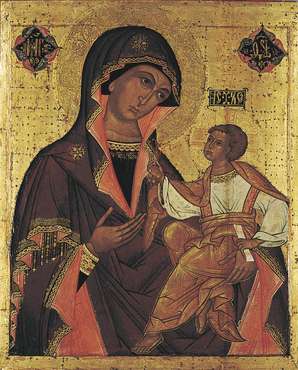 Georgian religious icon depicting the Mother of God holding the Christ child on a gold background with intricate detailing.
