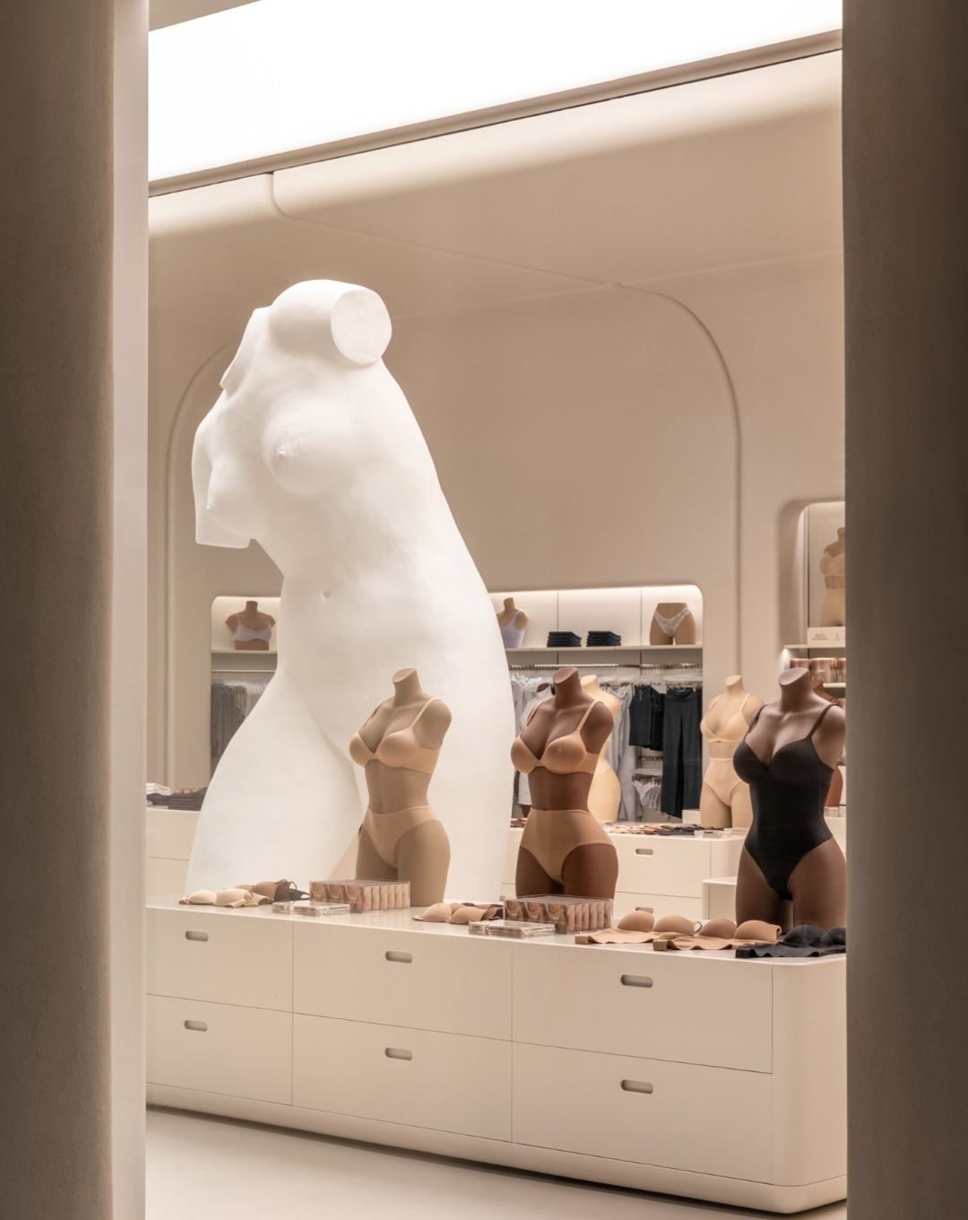 Skims flagship store interior minimalist 
