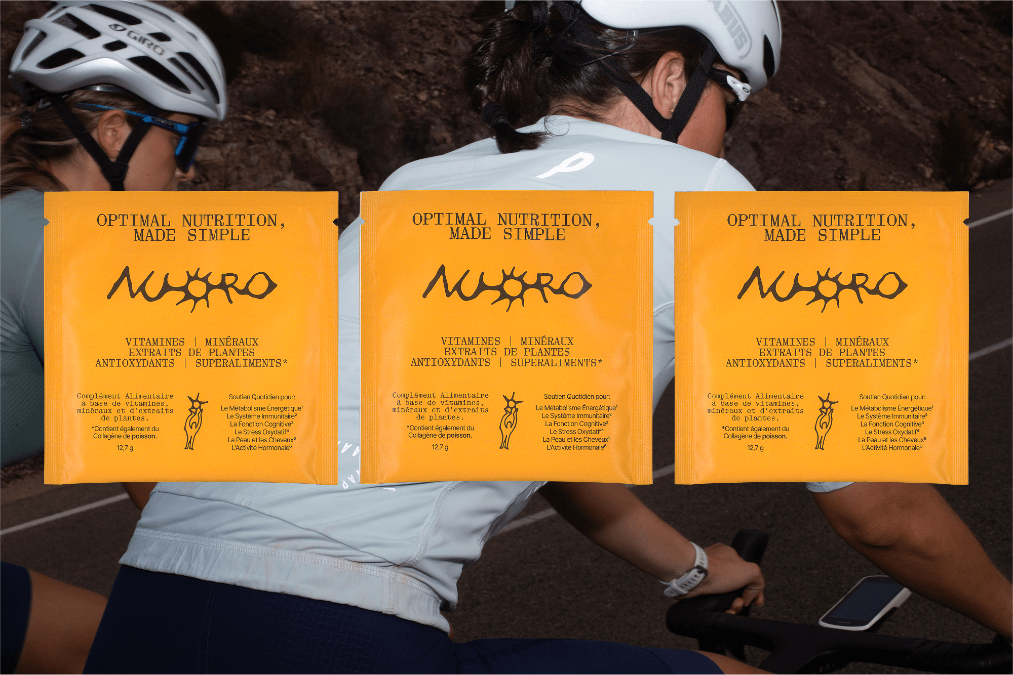 Three Nuoro nutrition supplement sachets in orange displayed against a cycling lifestyle backdrop packaging design by Onmi Design