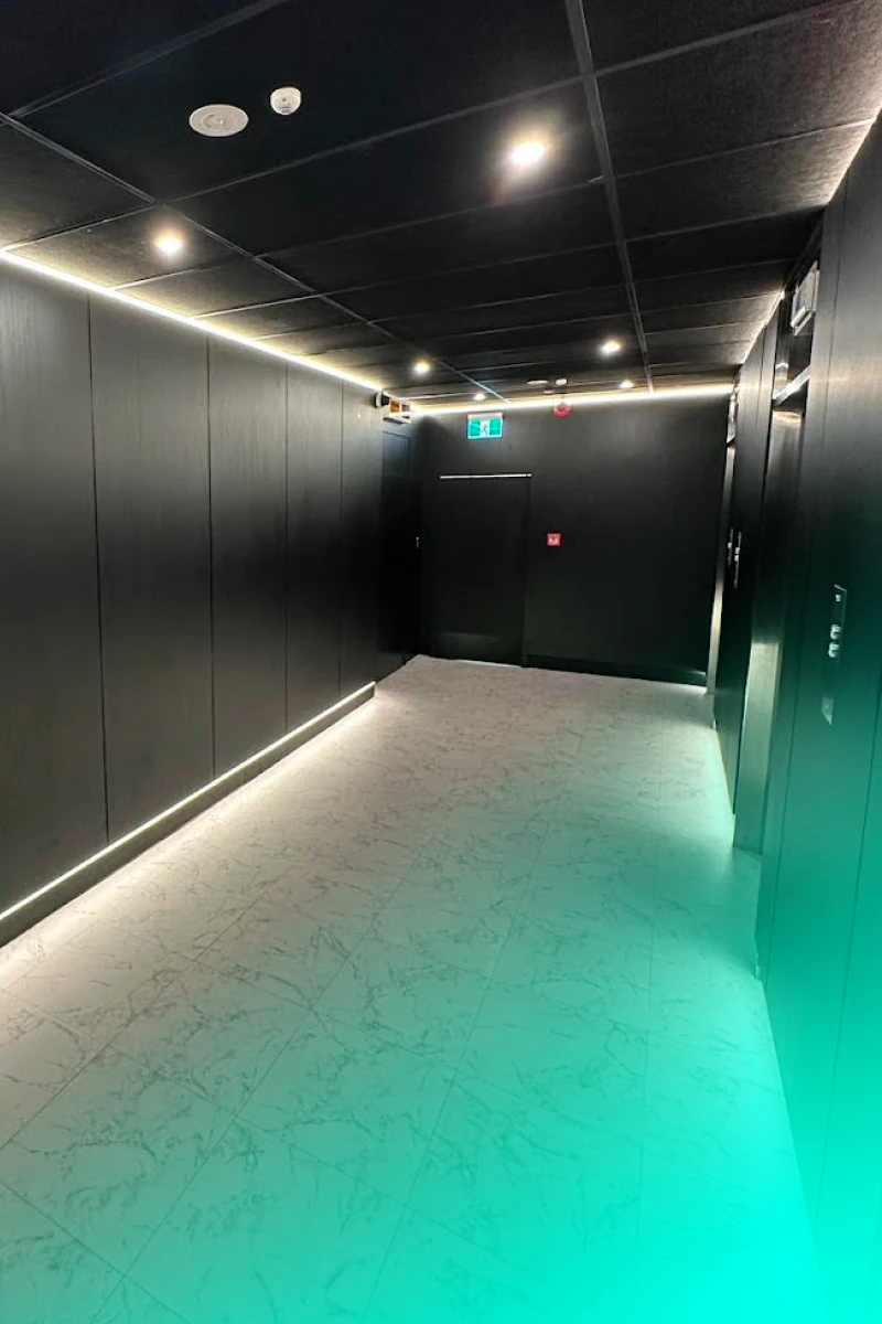 Image of a foyer outside of a modern looking data centre floor.