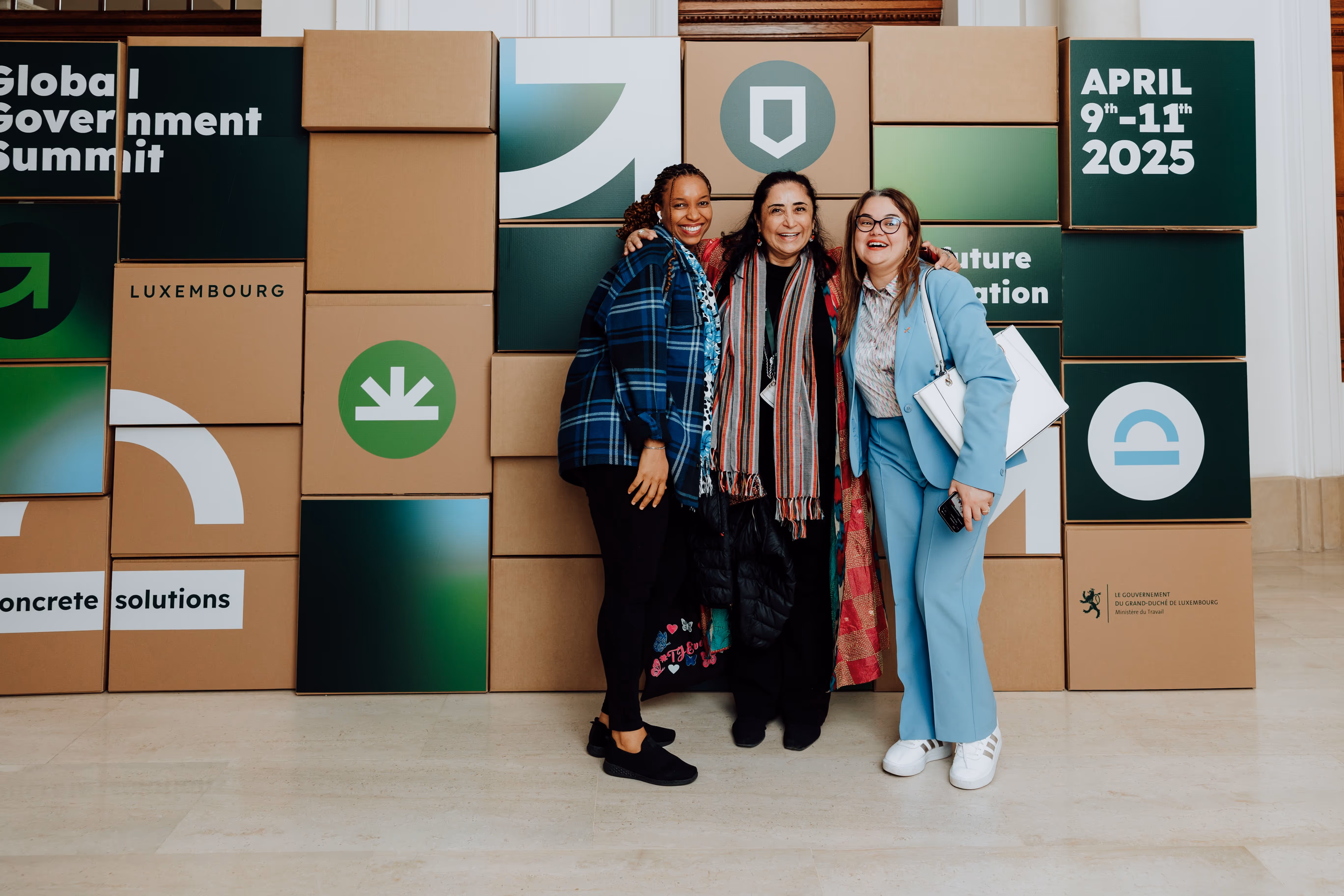 happy people in front of branded boxes