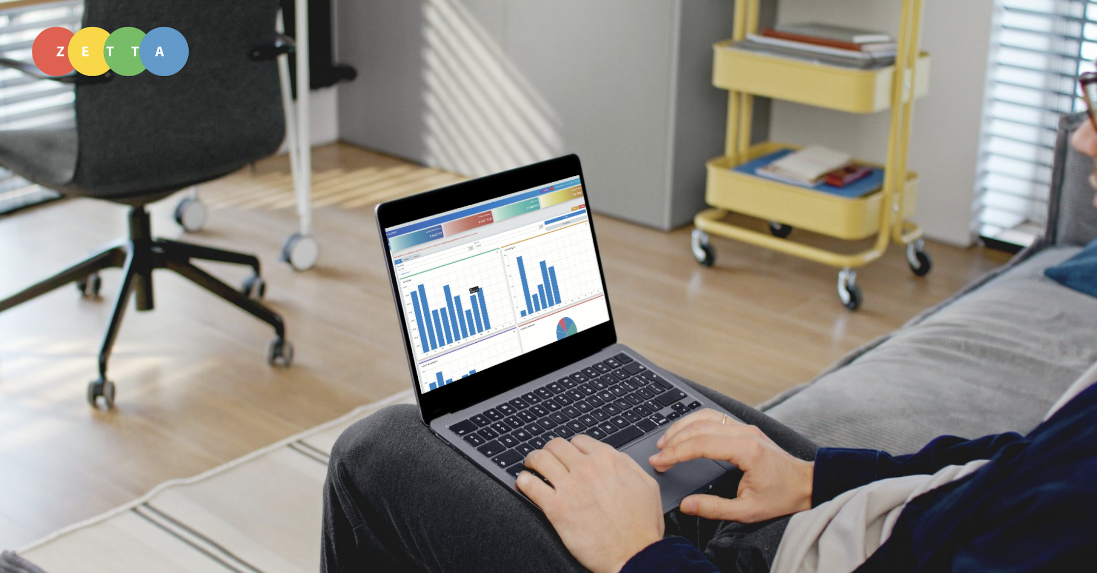 Person using a laptop with ZETTAPPs displayed on screen.