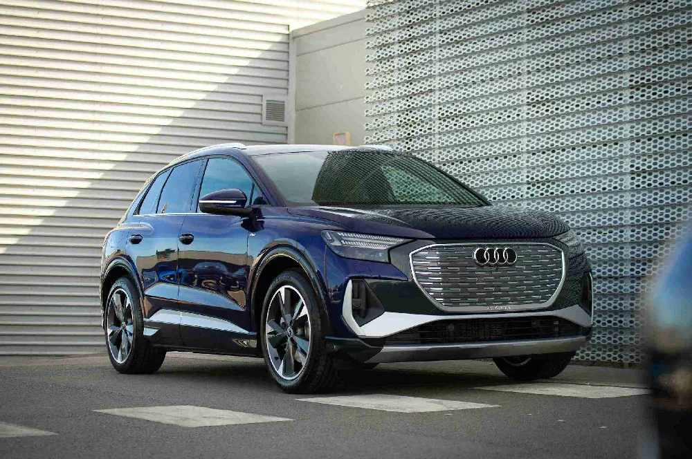 Audi Q4 e-tron zijaanzicht klaar voor verkoop via AutoInkoopSpecialist.nl.