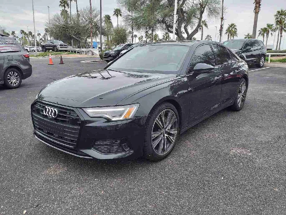 Grijze Audi A6 Avant geparkeerd voor de snelle verkoop aan AutoInkoopSpecialist.nl.