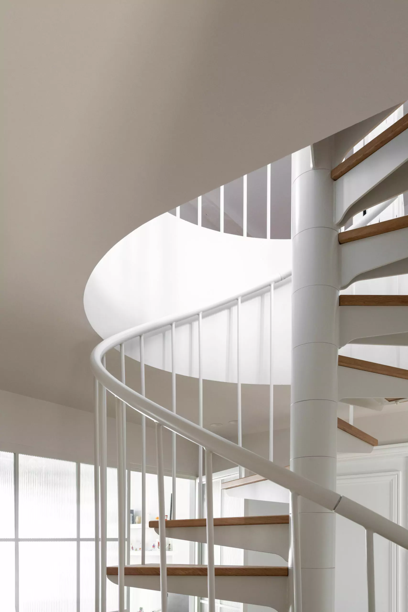 Aménagement intérieur – Escalier en colimaçon design – Projet Turgot CTEG