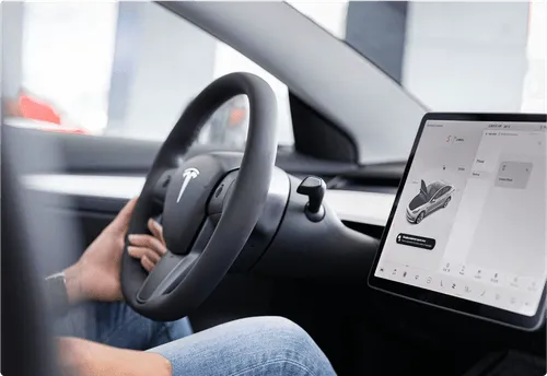 Driver's view of a connected car's dashboard screen with integrated applications.