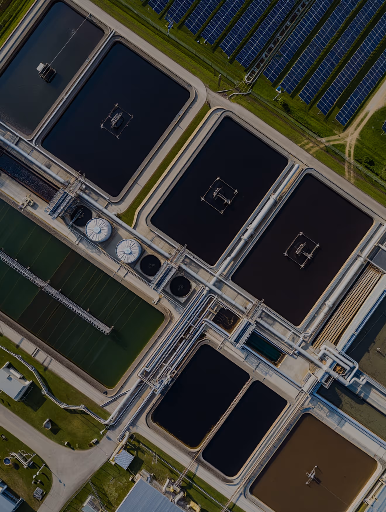 Wastewater treatment facility next to solar panels