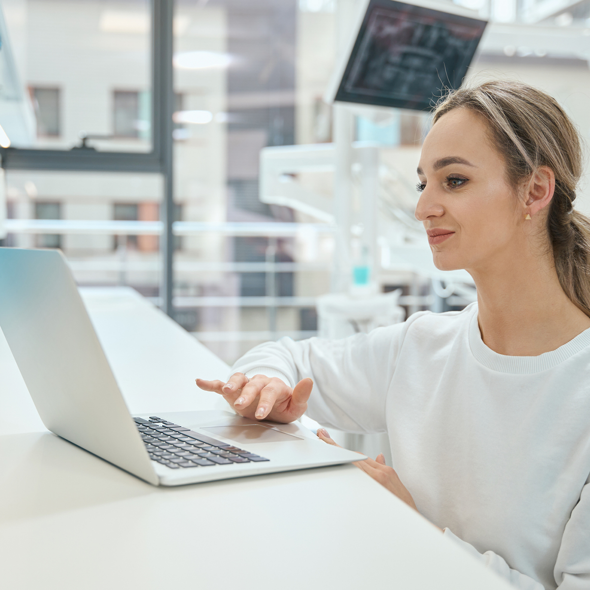 lab assistant using computer