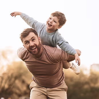 Man and his child playing
