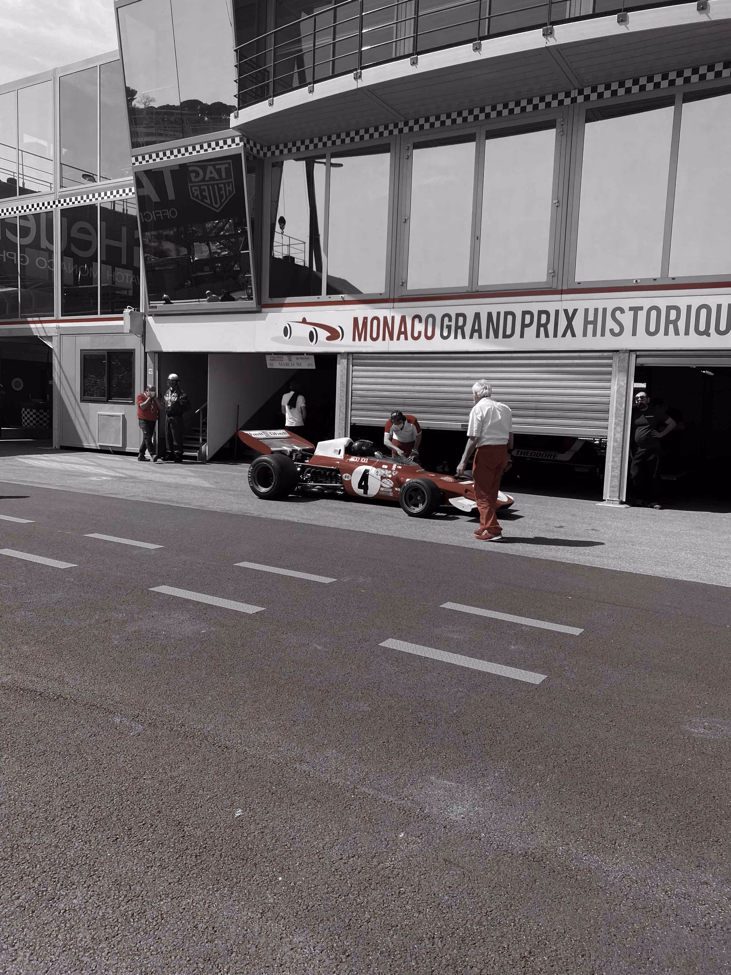 Race car outside Monaco Grand Prix Historique pit garages.