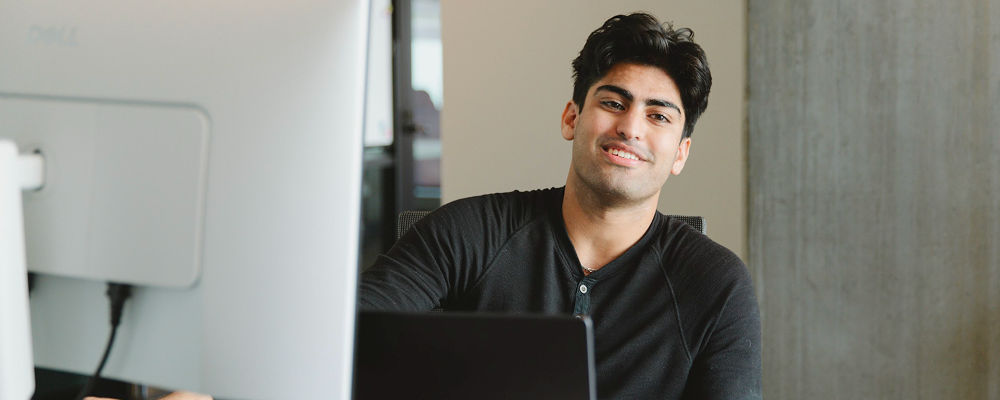 Whirl team member working at a desk
