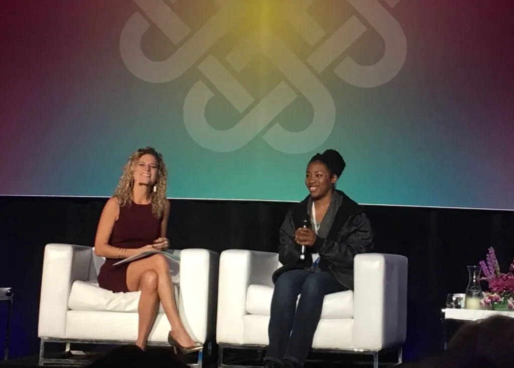 Brandie being interviewed at a Health Coaching Seminar
