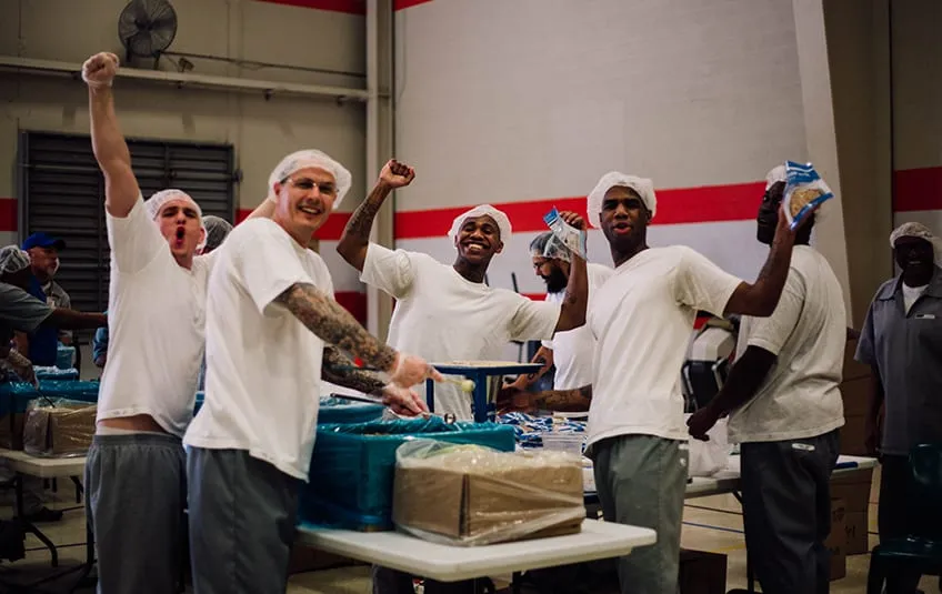 Volunteers in Prison Give Back, Pack 191,160 Meals For Children in Need
