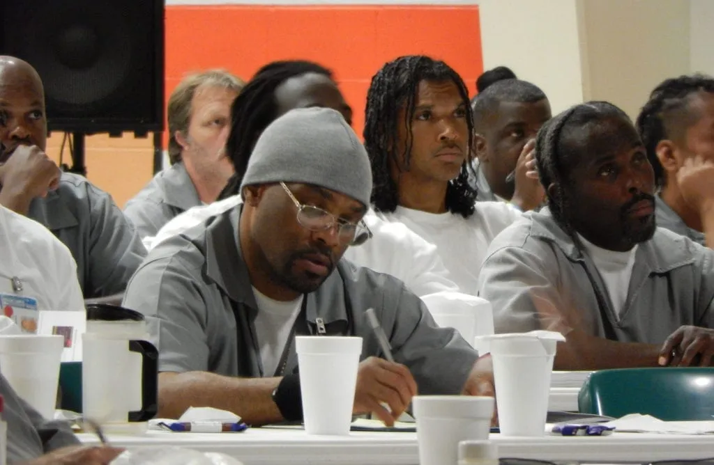 Inmates take notes at the 2018 GLS