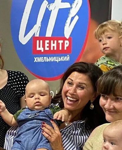 Nadia Gordynsky holding baby
