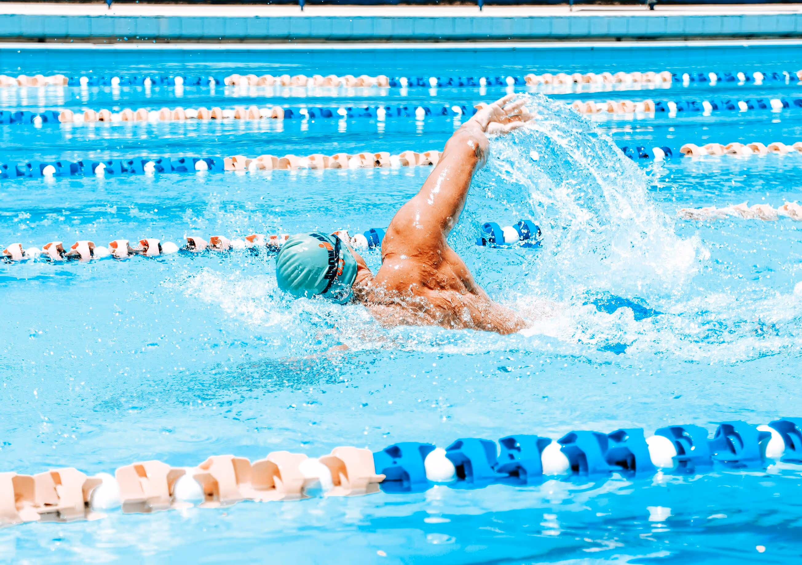 Swimmer doing freestyle stroke.