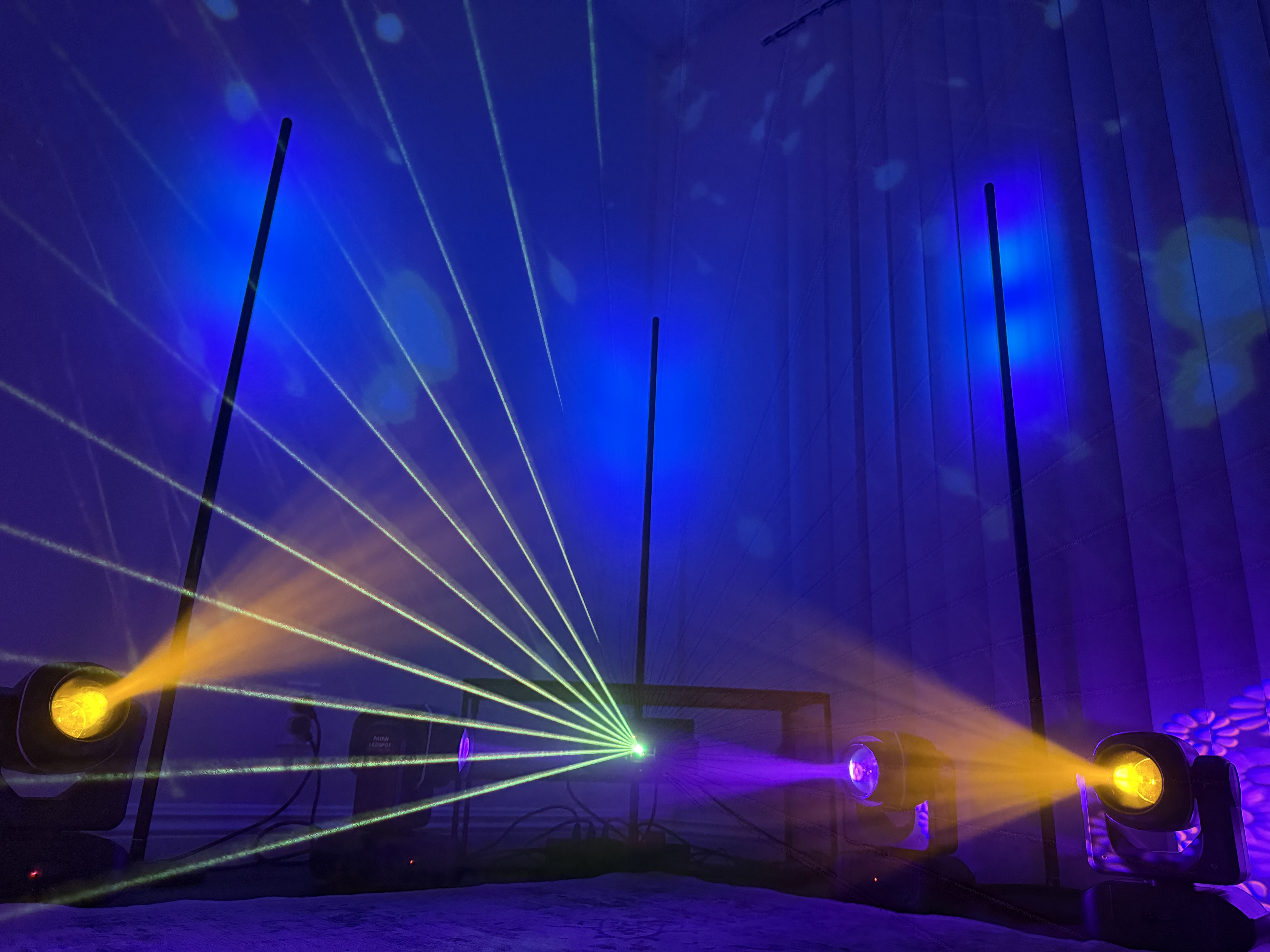 image of a dj setup in a dimly lit club