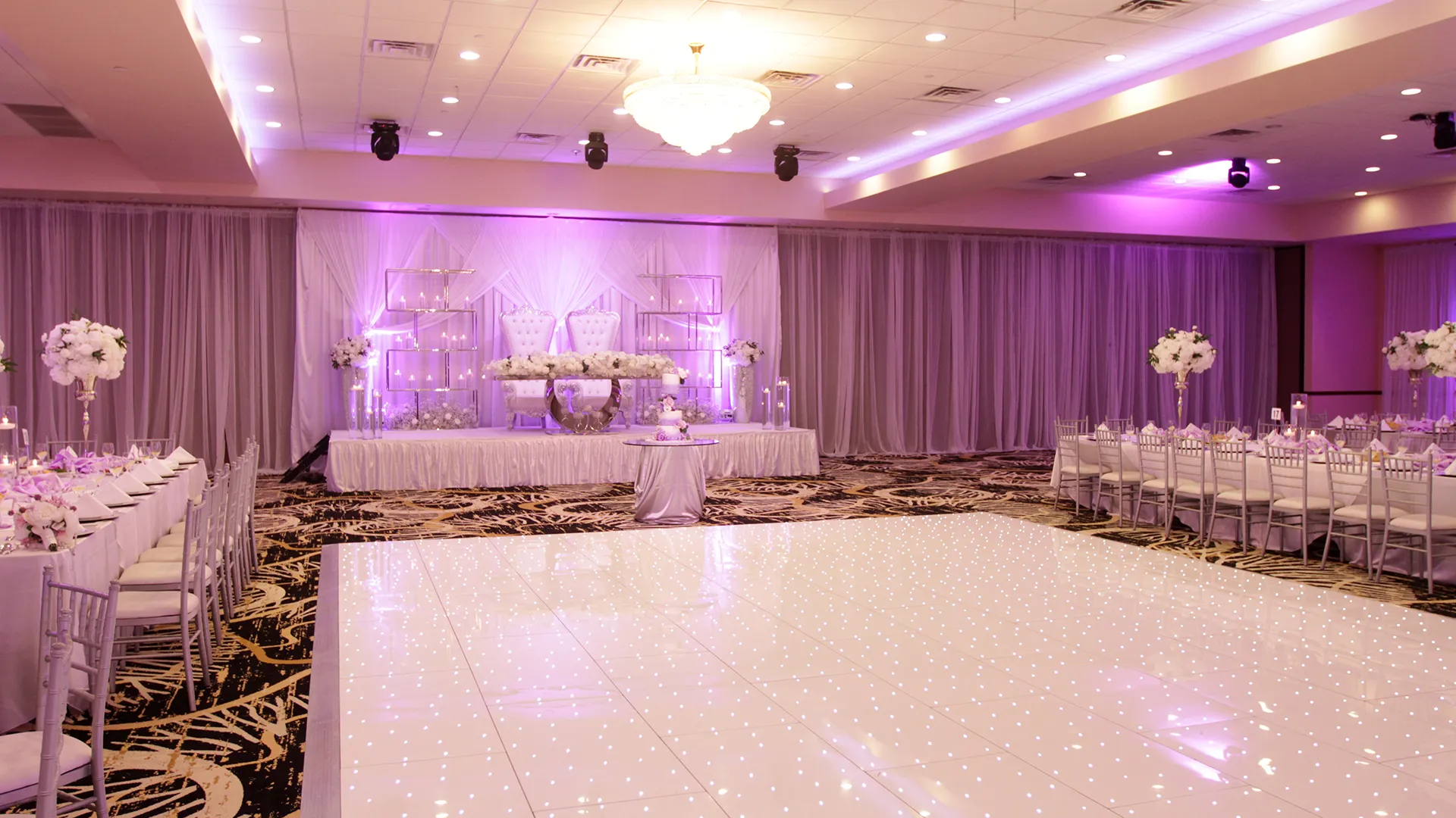 Venue Ballroom with Dance-floor and Decorated Head Table