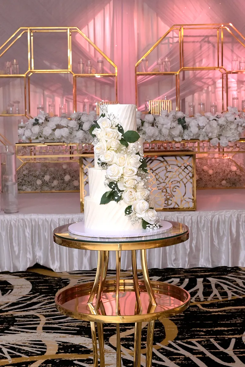 Closeup of White Wedding Cake with Flowers