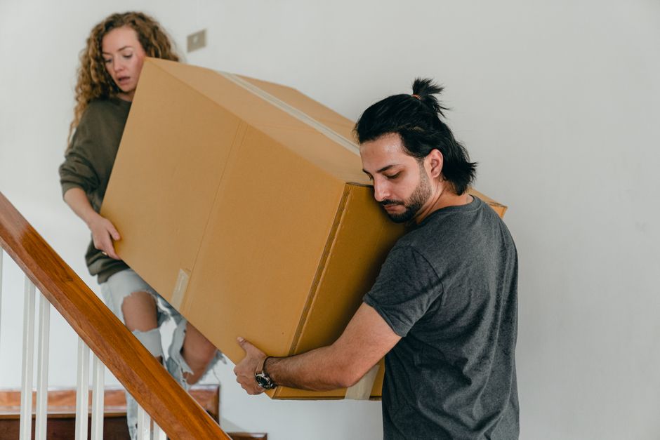 How to Move Heavy Furniture Down Stairs Without Wrecking Your Back or Your Walls
