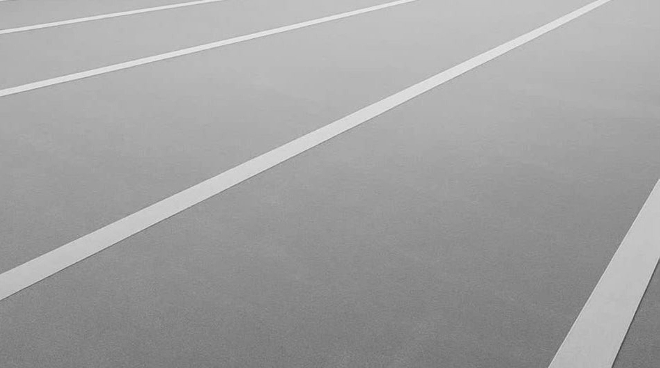 Close-up of grey felt fabric with evenly spaced white stripes.