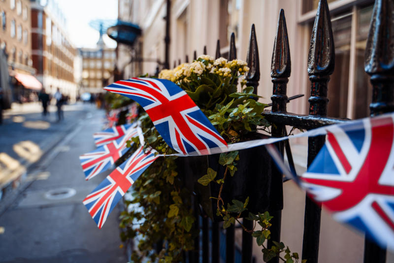 Close-up of Union Jack flags decorating a London street on a sunny day