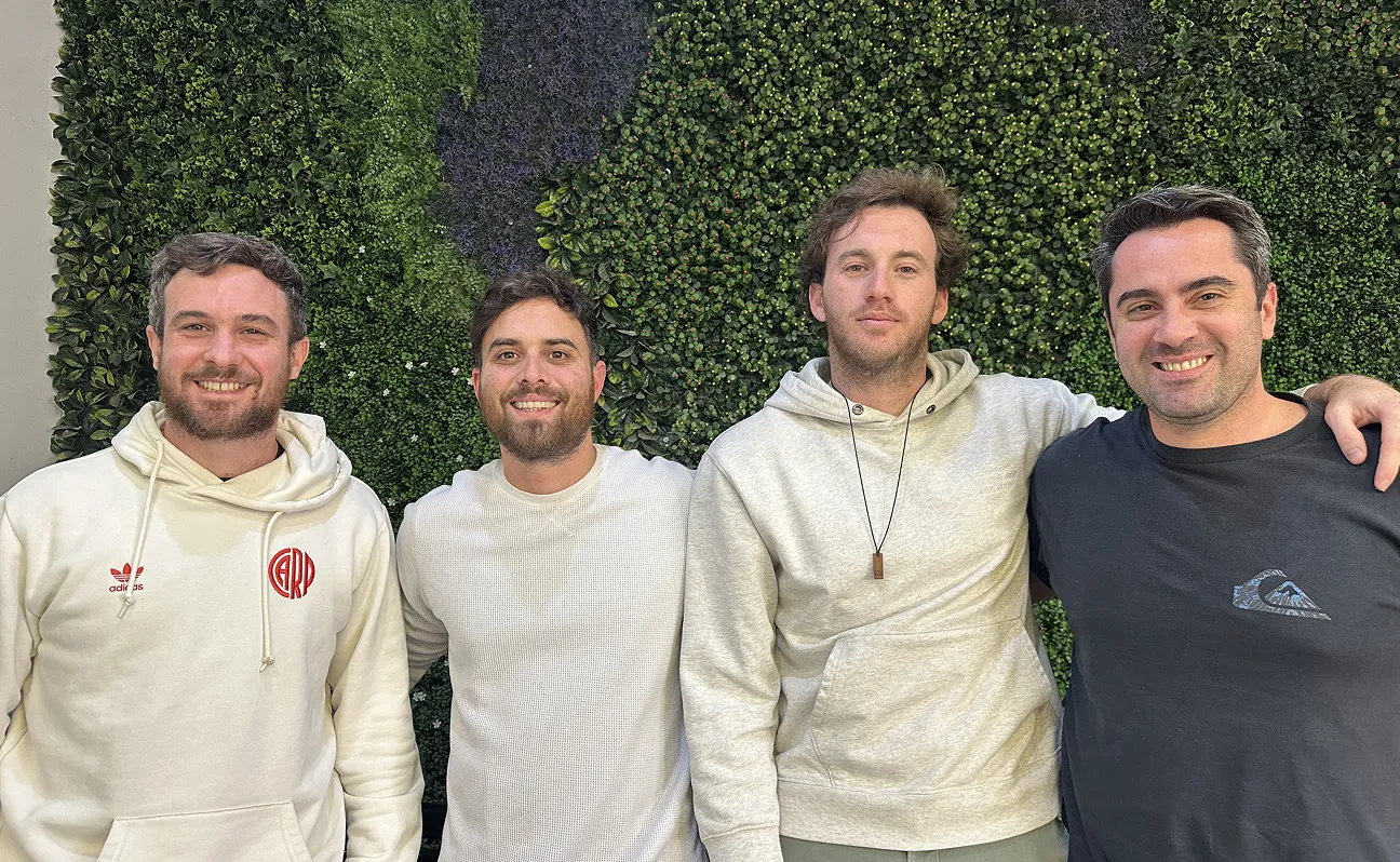 A group of men standing next to each other.