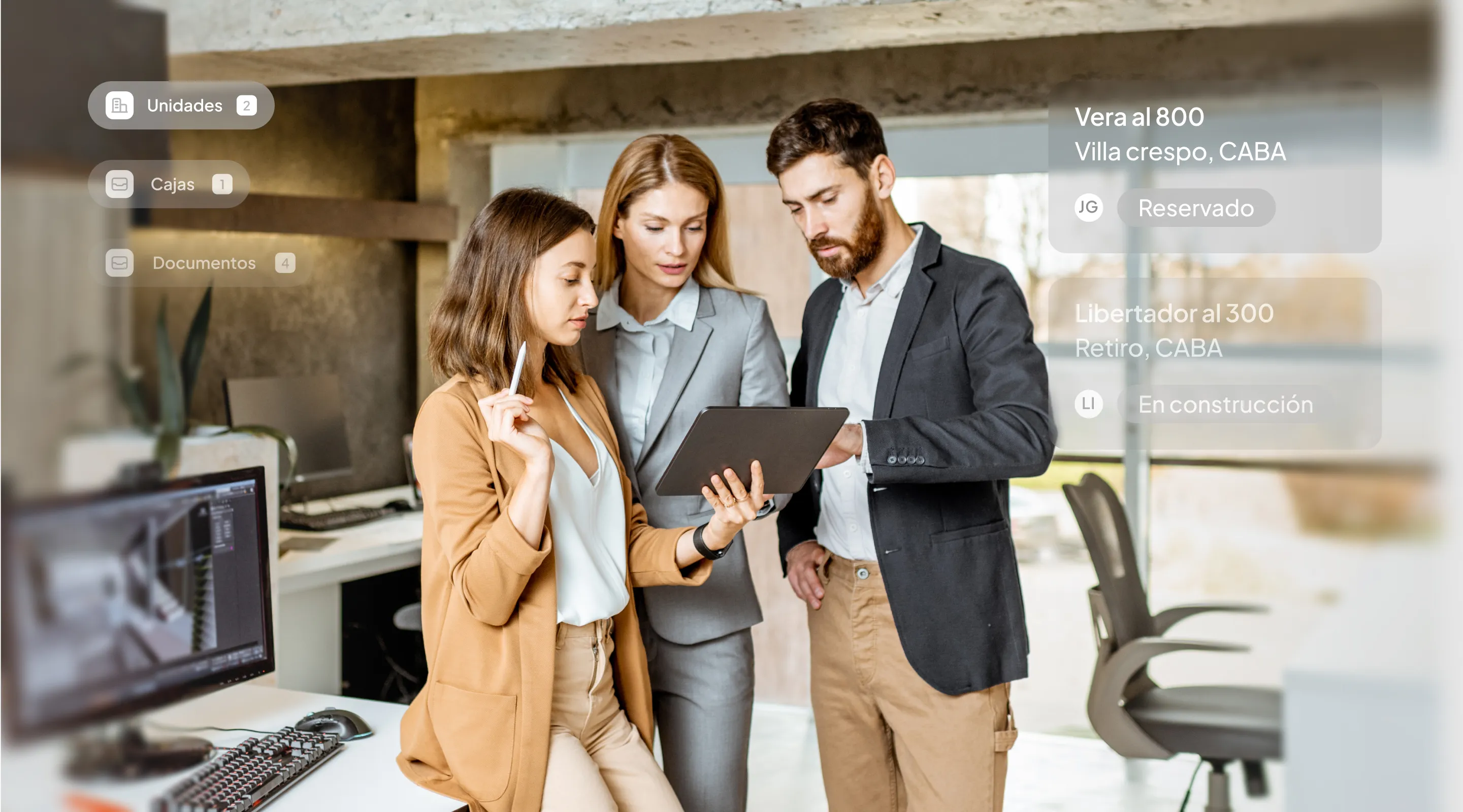 Three professionals in business attire review information on a tablet in a modern office, with digital real estate listings and labels overlaid on the image.