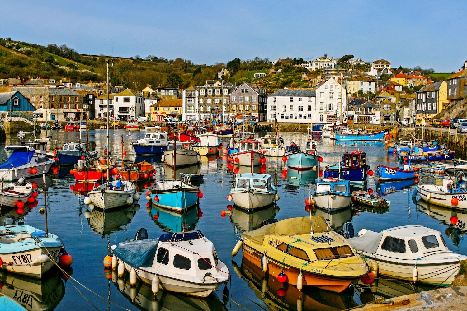St Austell town centre with surrounding rooftops and views toward Carlyon Bay in Cornwall