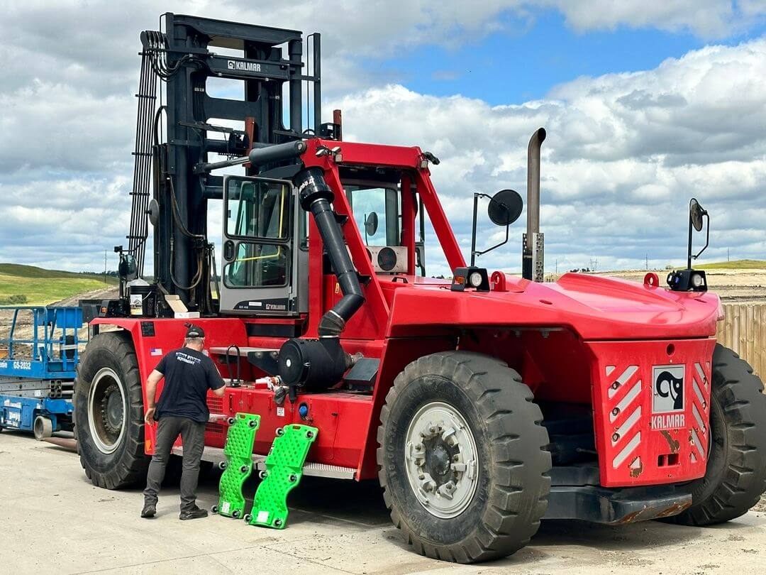Large Kalmar Forklift working on assembly after moving