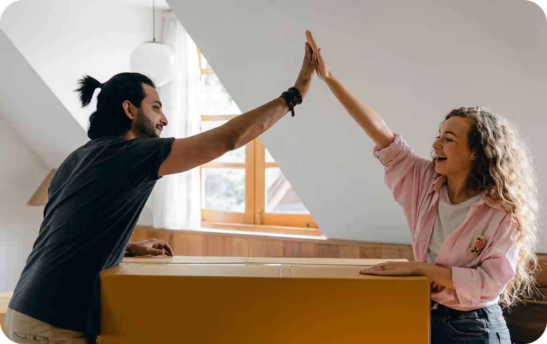 Happy couple sharing high-five