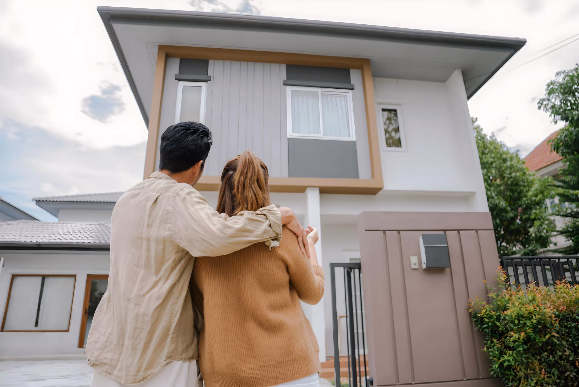 Couple looking at their new home.