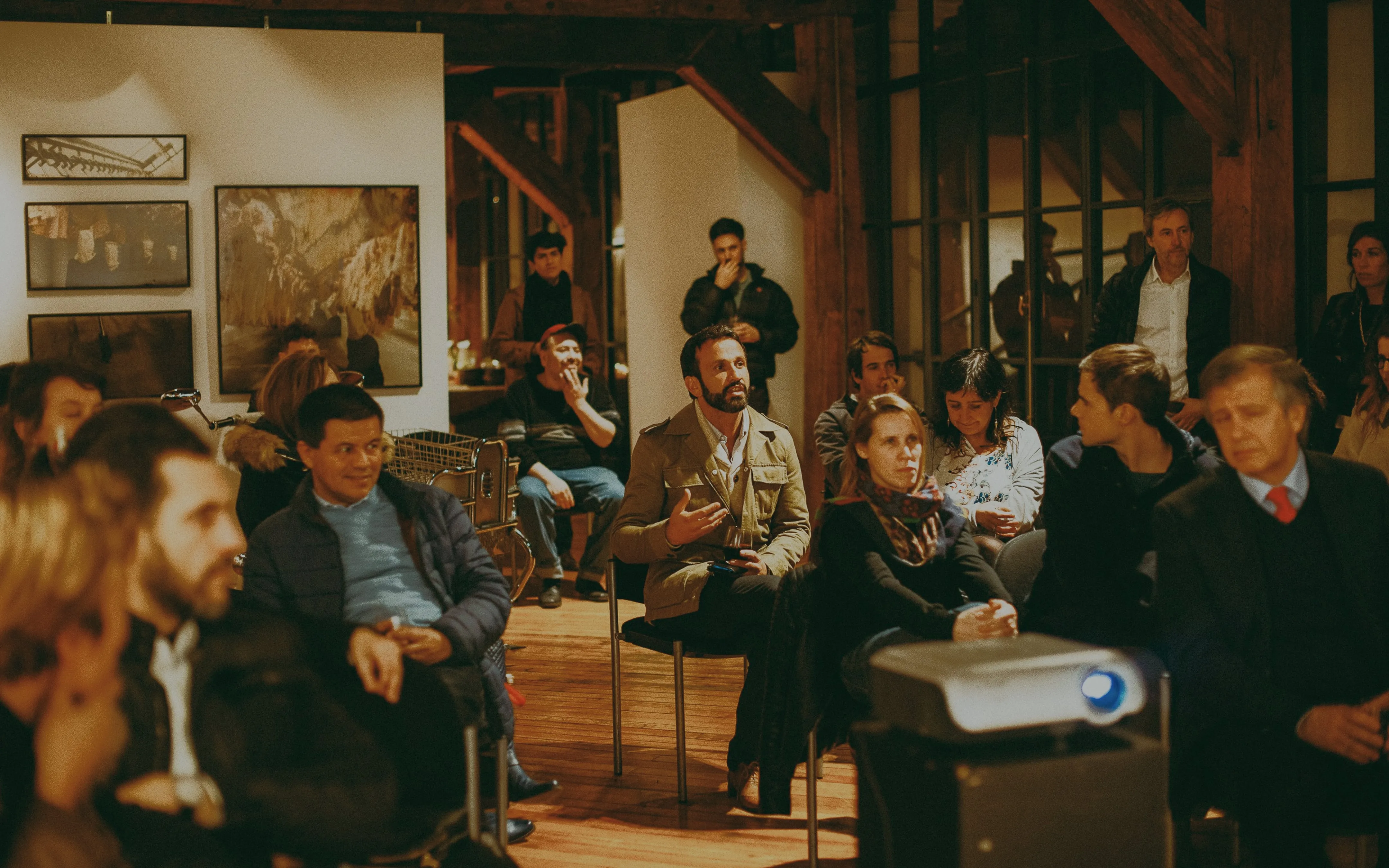 People socializing and dining in warm, ambient restaurant or social house interior