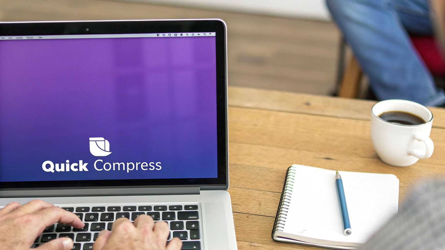 A person types on a laptop displaying 'Quick Compress' software, next to a coffee cup and notebook.