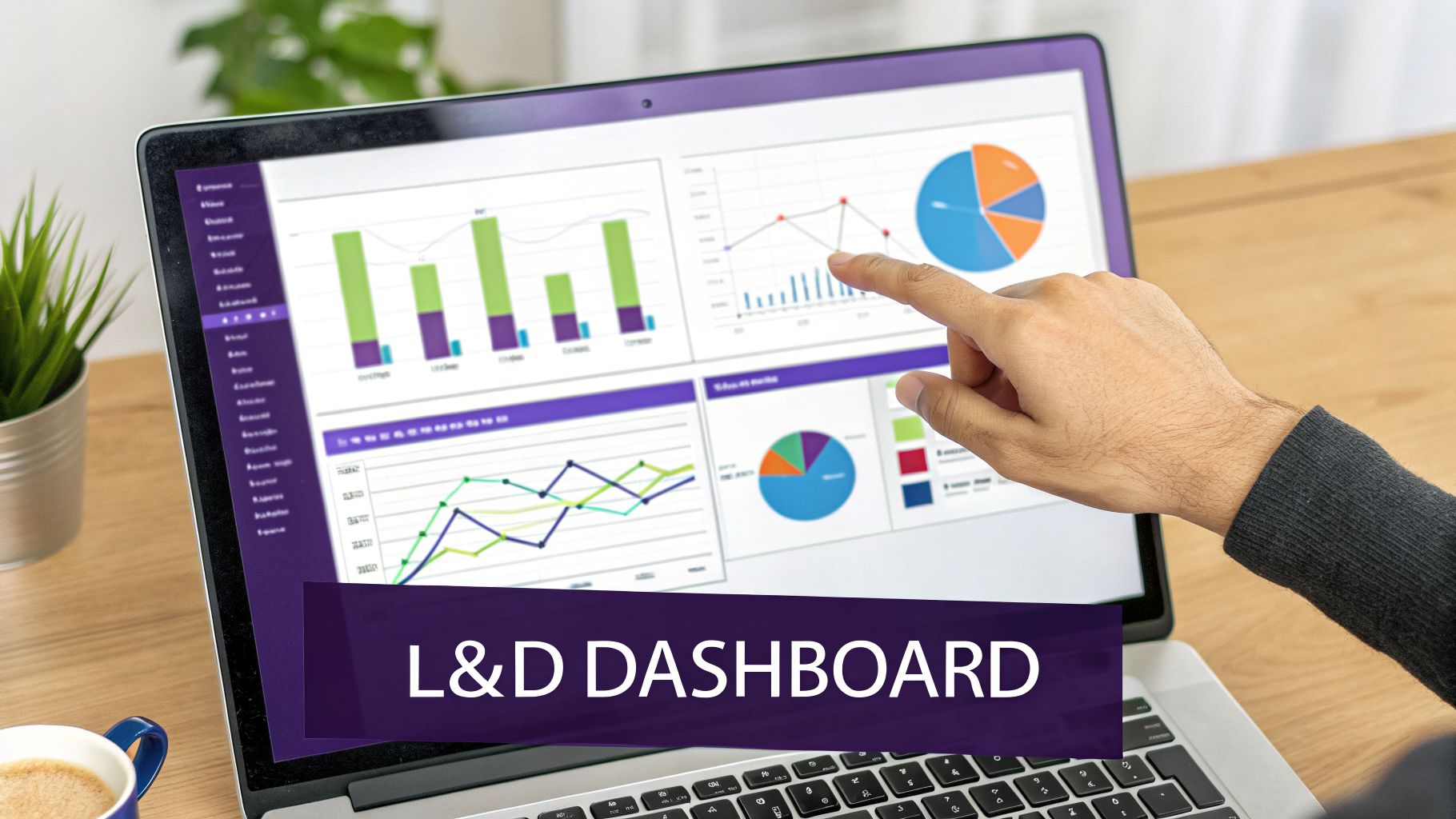 A hand interacts with a laptop displaying a vibrant L&D dashboard with data visualizations.