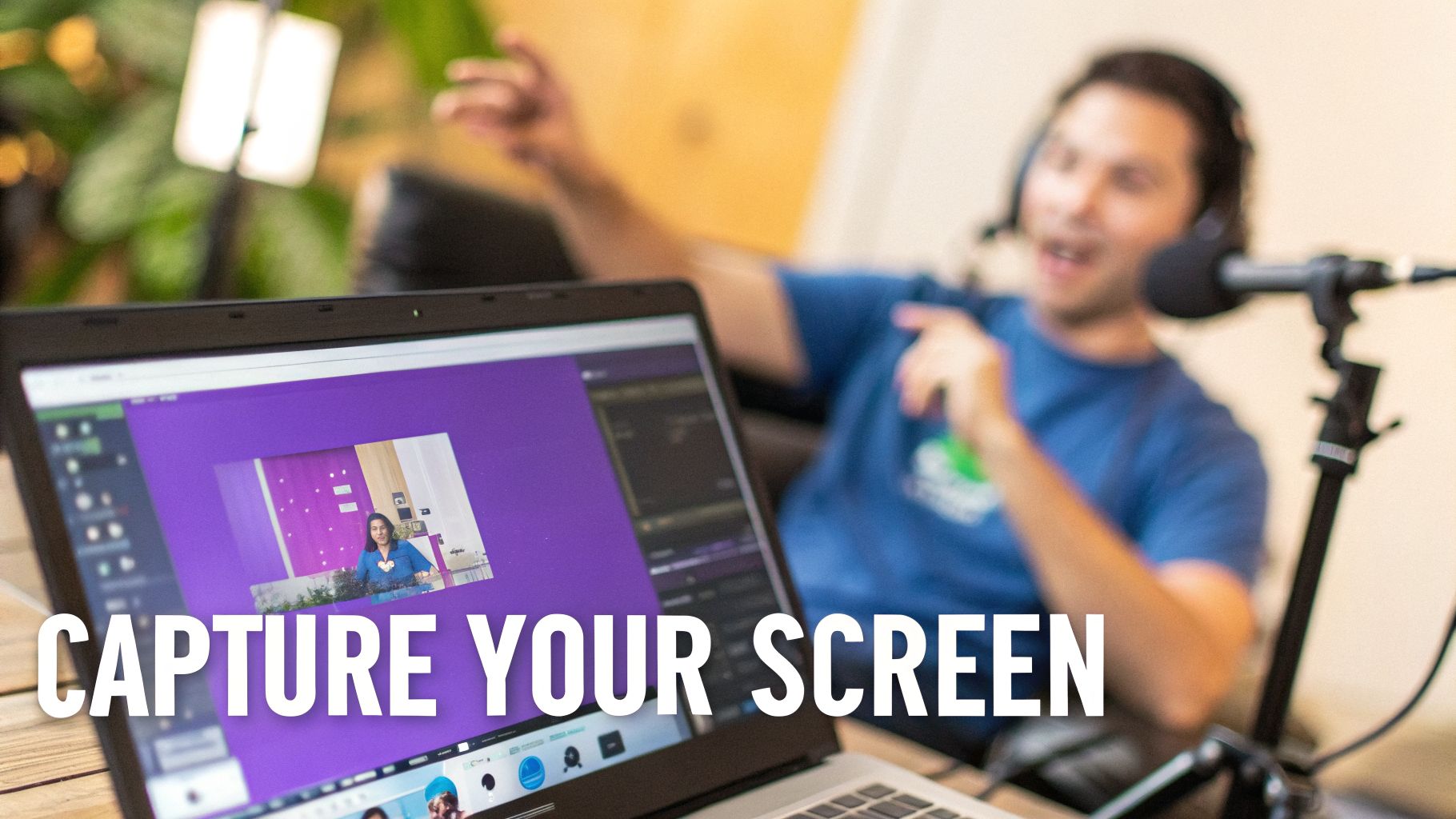 Laptop showing a screen capture of a woman in a video call, with a man speaking into a microphone.