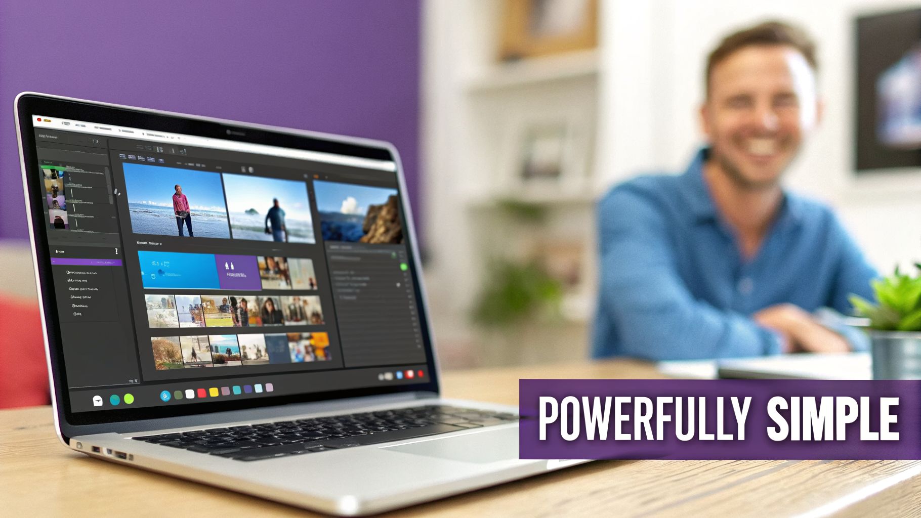 A laptop on a wooden desk displaying video editing software, with a smiling man blurred in the background.