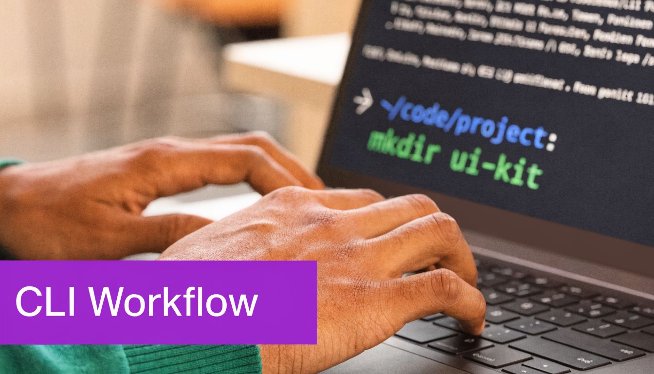 A developer types the command to create a new folder into a terminal on a laptop.
