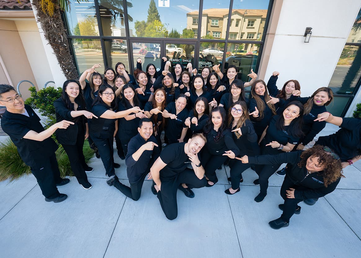 Dental marketing and branding doctor with patient dental team