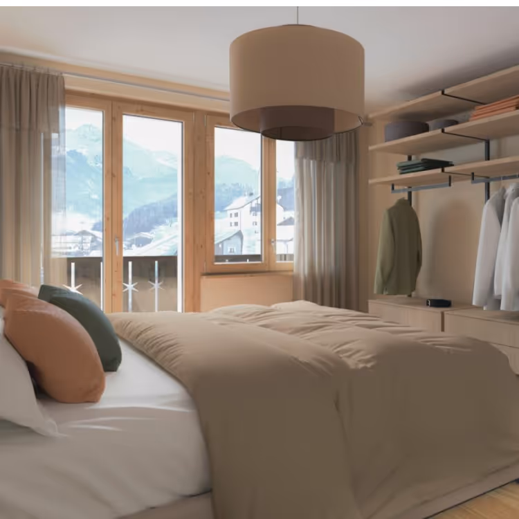 tgesa ROMANA Savognin - Restaurant & Apartments: Cozy bedroom with mountain view