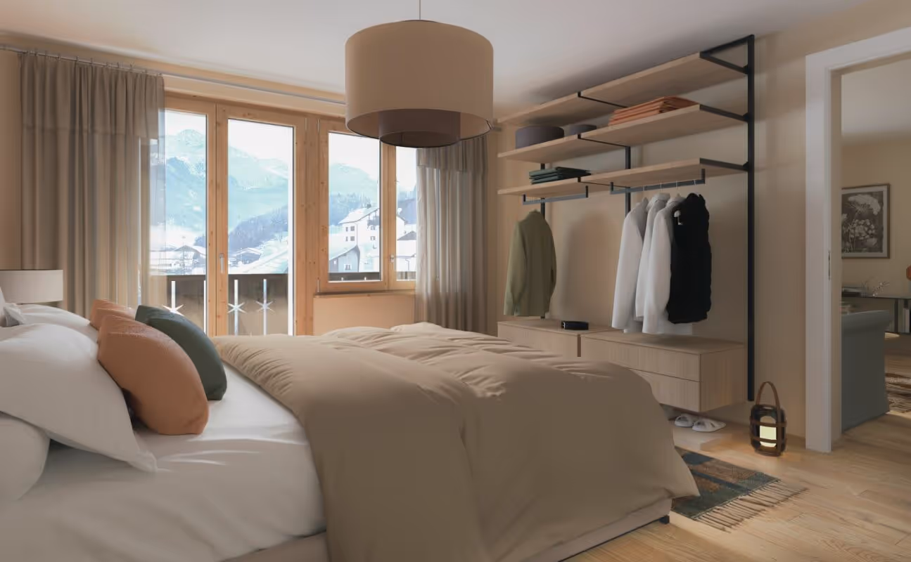 tgesa ROMANA Savognin - Restaurant & Apartments: Cozy bedroom with mountain view