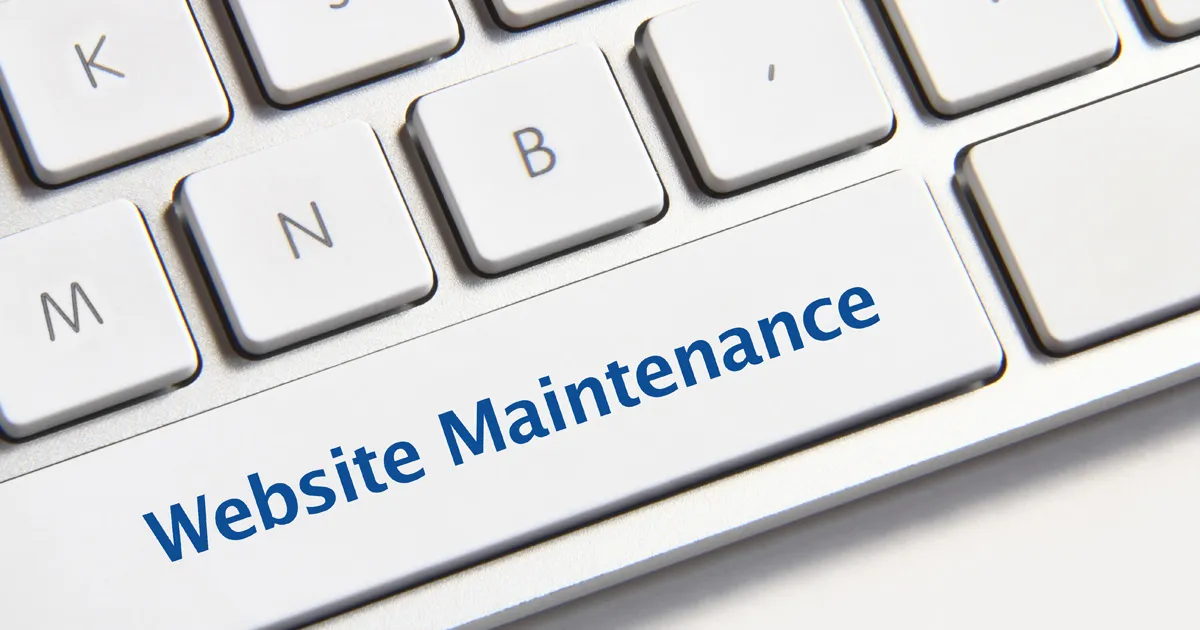 Keyboard with the text Website Maintenance on the space bar key