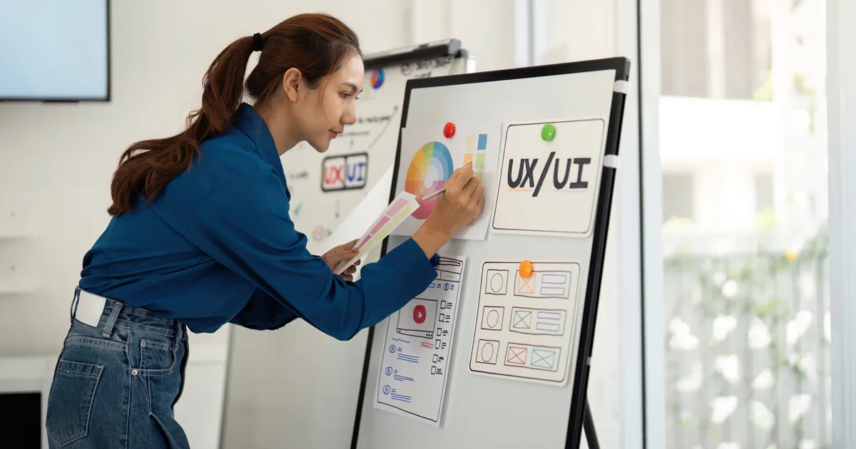 UX and UI Designer Presenting Ideas in Team Meeting.