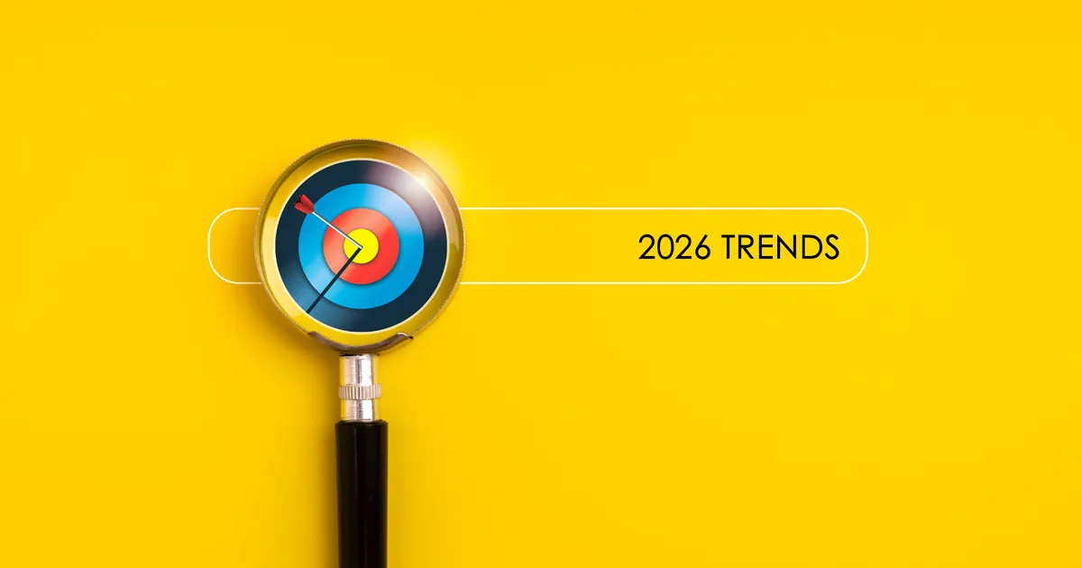 Magnifying glass focused on modern 3d target icon with arrow and "2026 Trends" text in search bar on bright yellow background. Concept of future trend research, business strategy, and goal setting.
