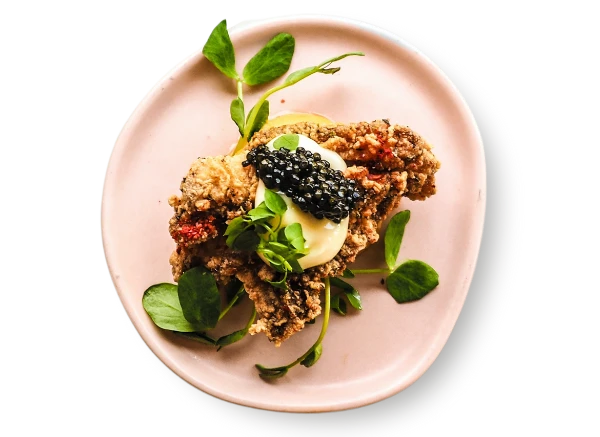 Plate with salad and caviar