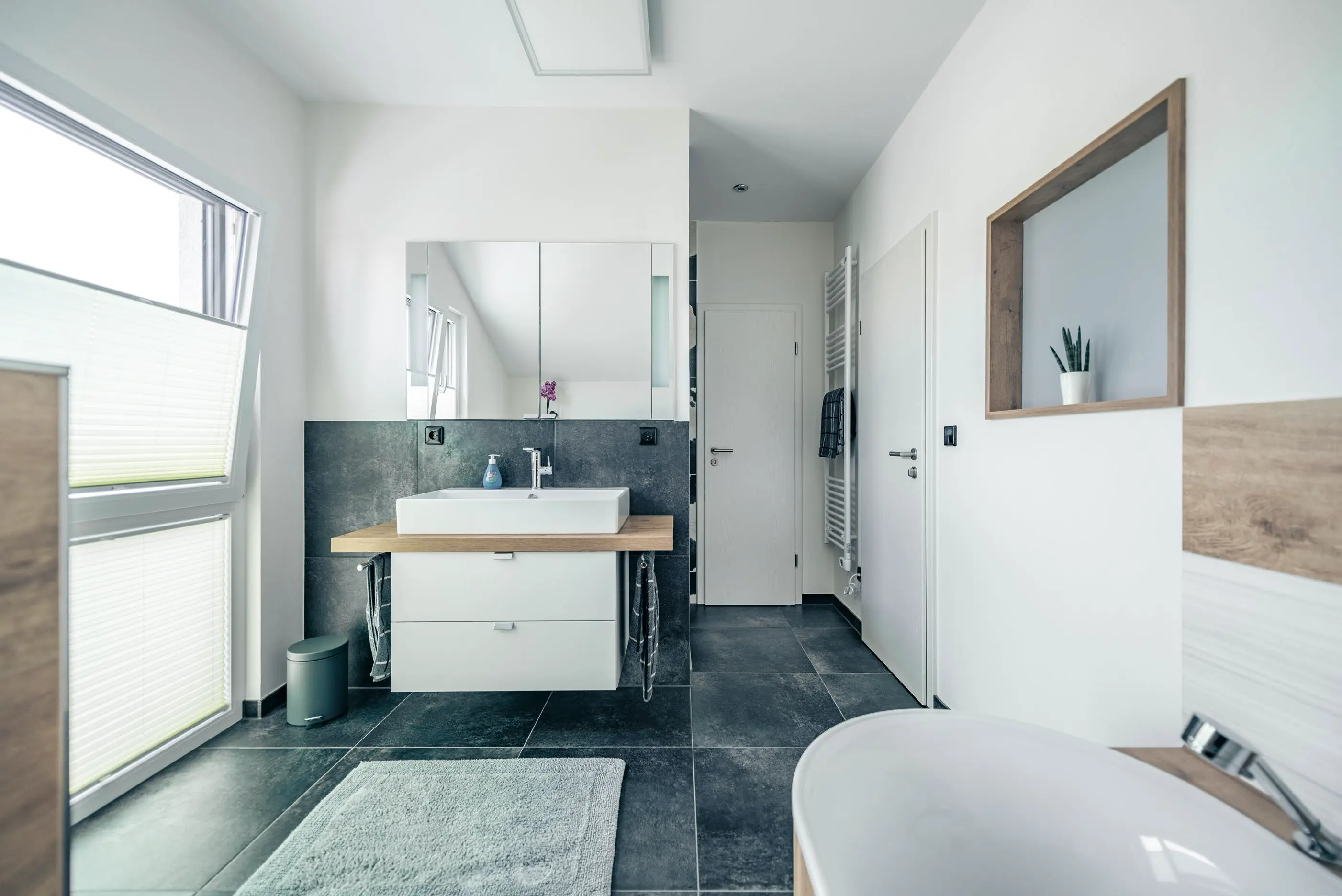 Badezimmer im Einfamilienhaus Authentic in Vöhringen, gebaut von Hauser Massivbau