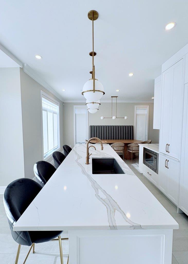Contemporary living area with open layout and wood floors