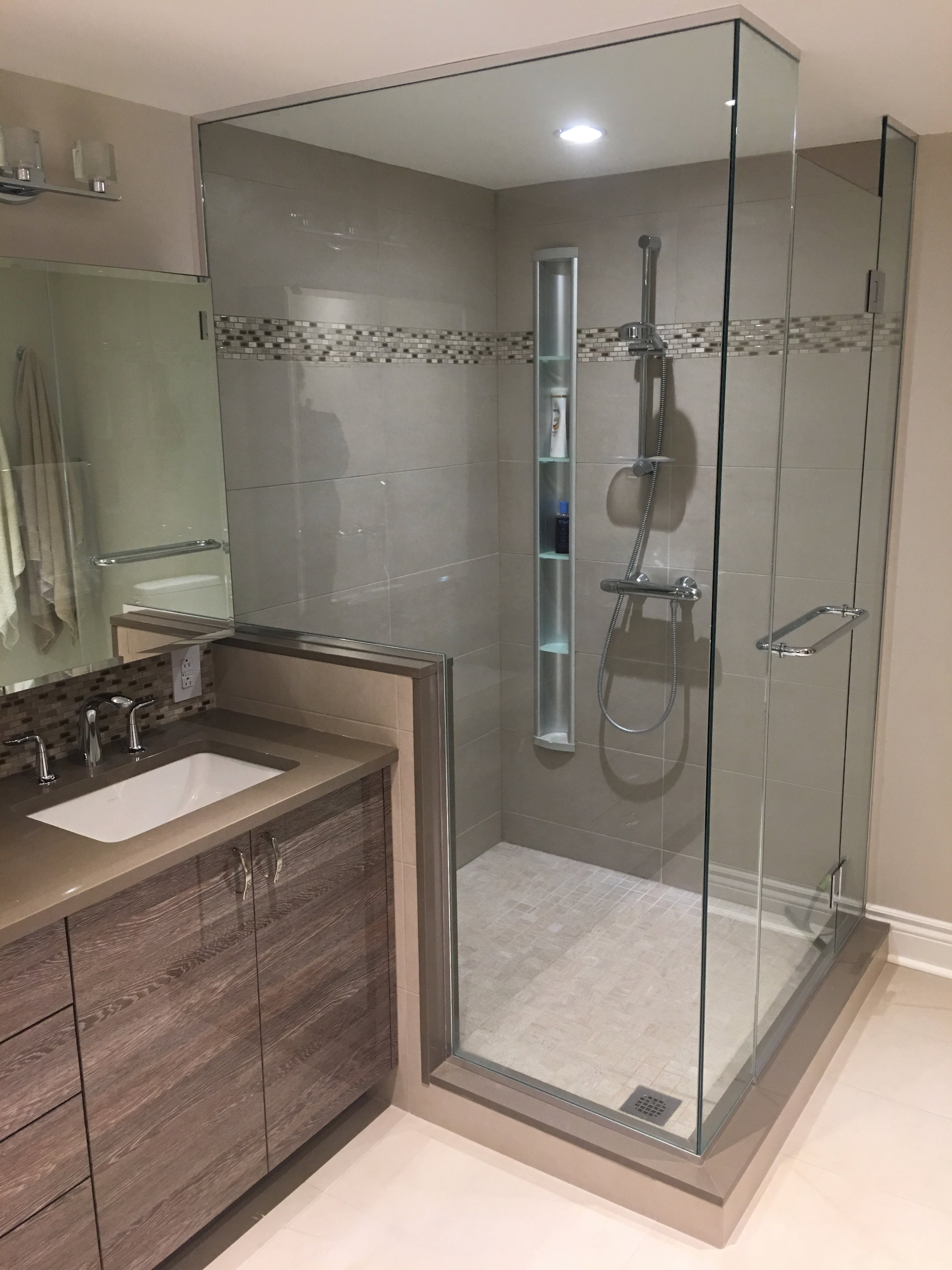 Contemporary bathroom with floating vanity designed