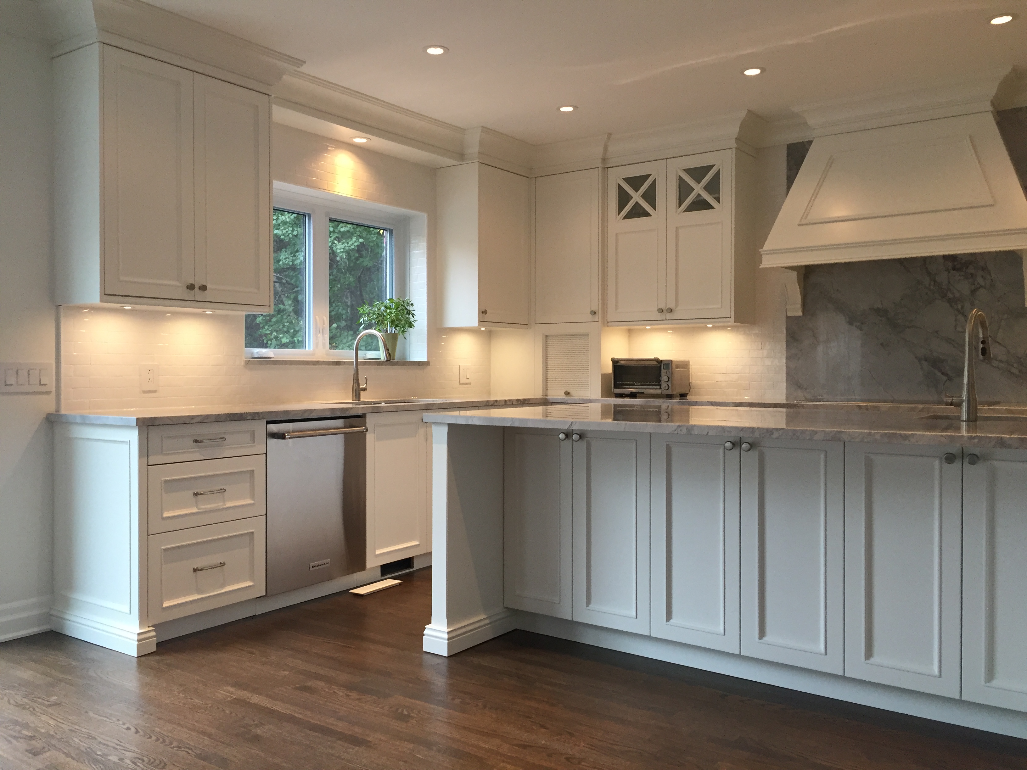 Contemporary kitchen with stainless steel finishes